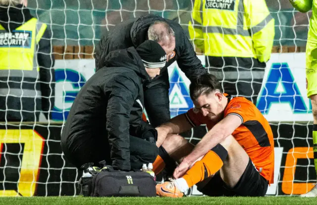 Dundee United's Declan Gallagher after picking up an injury against Partick Thistle