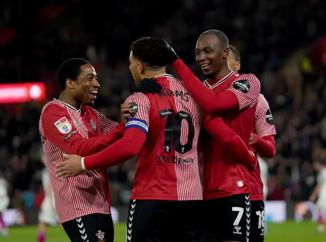 Southampton players celebrate their side's fourth goal against Swansea on Boxing Day