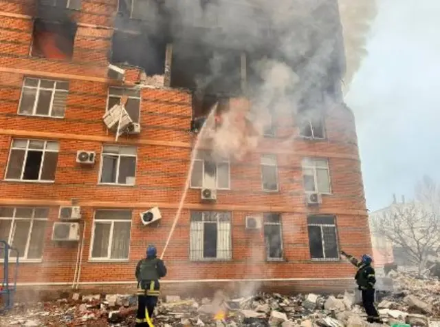 Firefighters at a building in Odesa