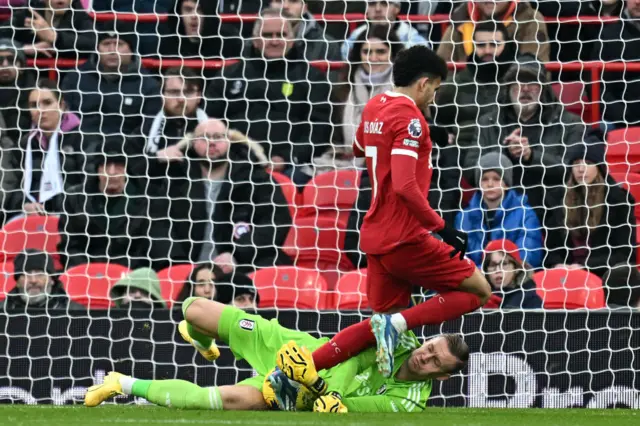 Bernd Leno is injured in this collision with Luis Diaz