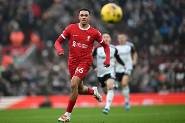 Trent Alexander-Arnold chases the ball