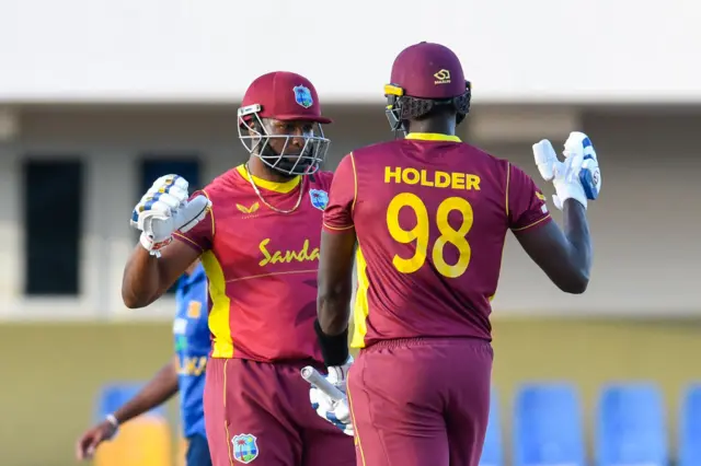 Kieron Pollard and Jason Holder