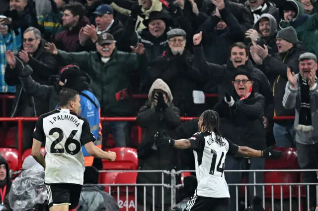 Bobby Decordova-Reid celebrates in front of the Fulham supporters