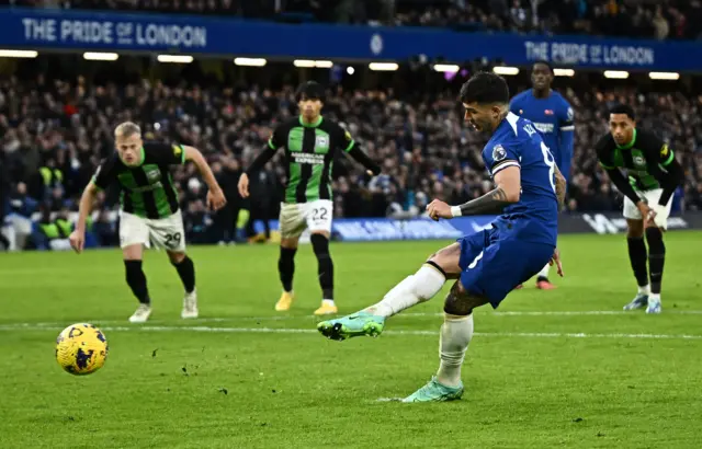 Enzo Fernandez scores their third goal from the penalty spot