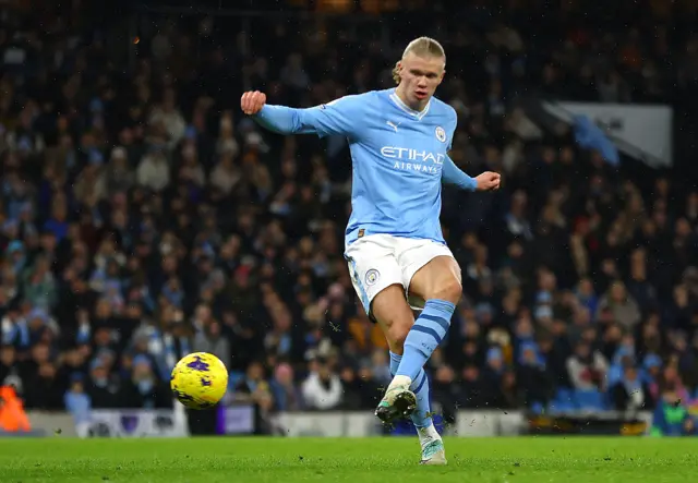 Erling Haaland shoots at goal