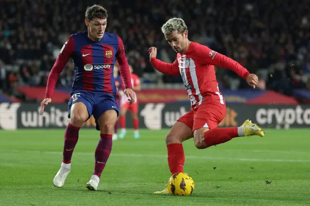 Antoine Griezmann battles with Andreas Christensen