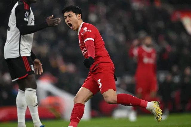 Wataru Endo celebrates