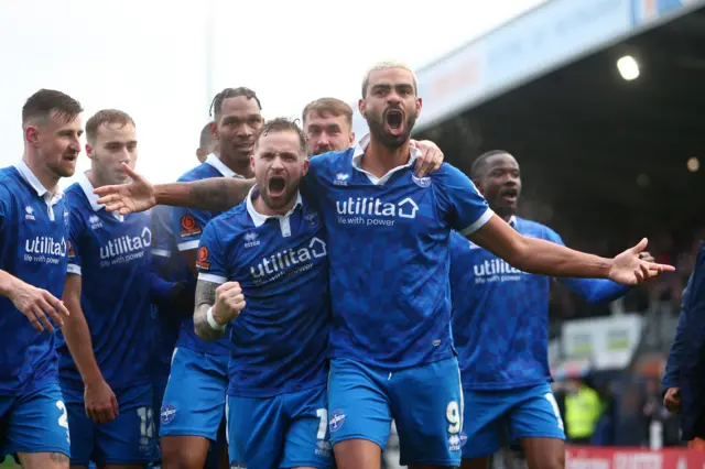 Eastleigh celebrate their winning goal against Reading