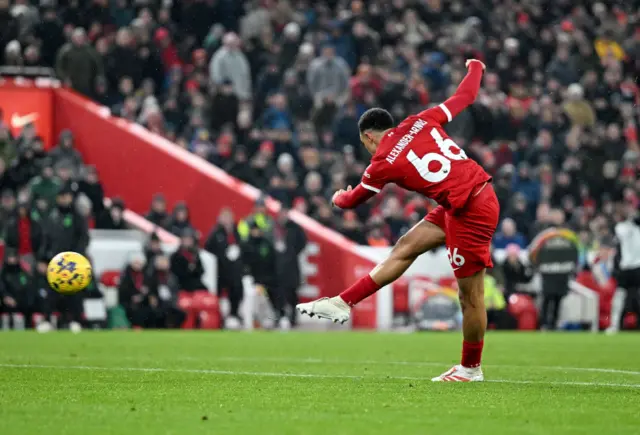 Trent Alexander-Arnold of Liverpool scores Liverpool's fourth goal