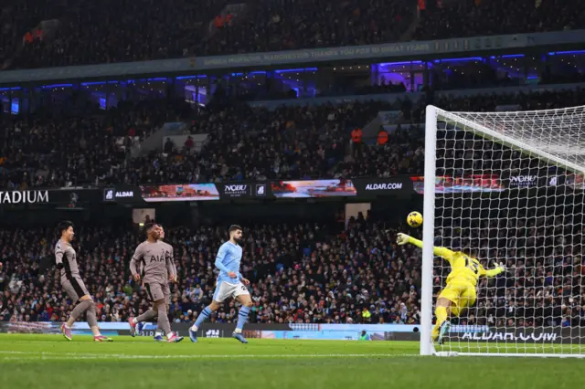 Son Heung-Min of Tottenham Hotspur scores an own goal to make it 1-1