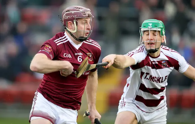 Slaughtneil's Shane McGuigan battles with Cushendall's Eoghan Campbell in Newry