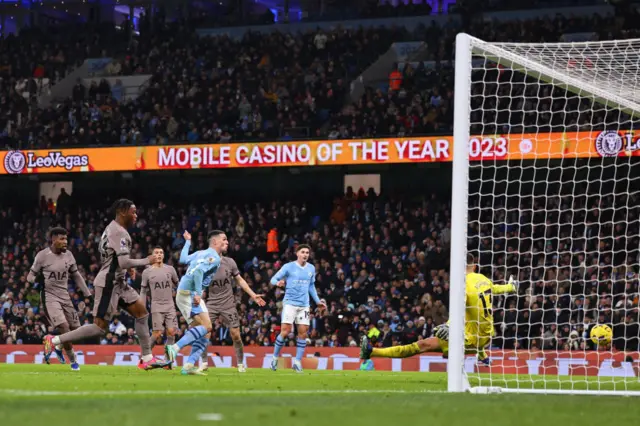 Phil Foden of Manchester City scores a goal to make it 2-1