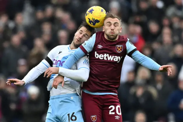 Joachim Andersen vies with Jarrod Bowen