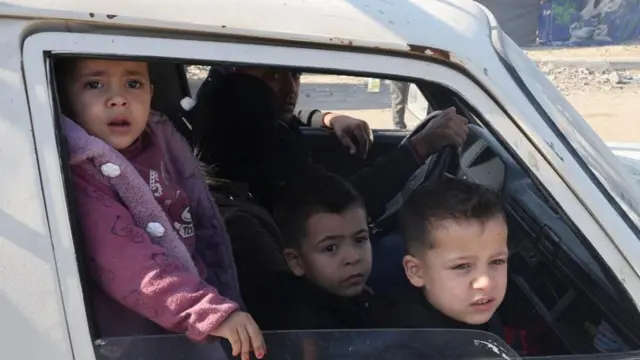 Family in car in Rafah