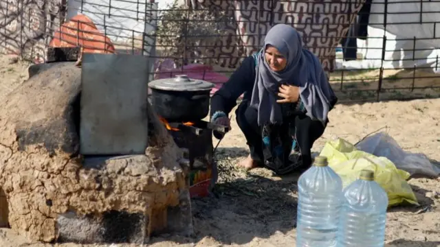 Woman  cooking outside