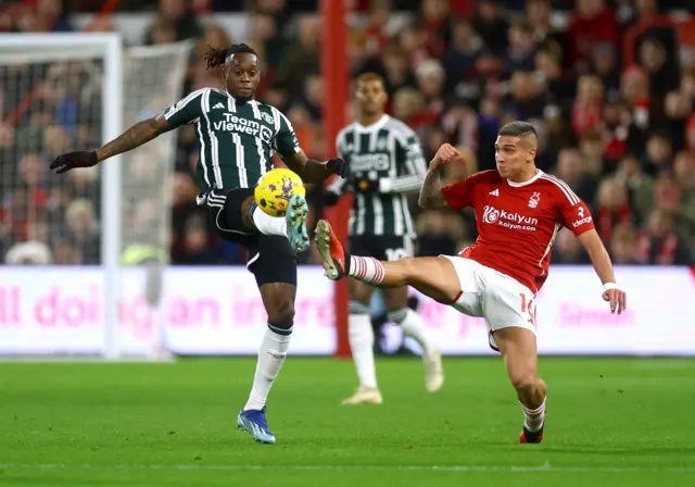 Aaron Wan-Bissaka and Nicolas Dominguez