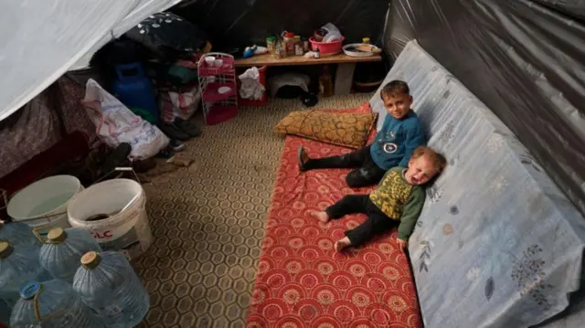 Children in tent in Rafah