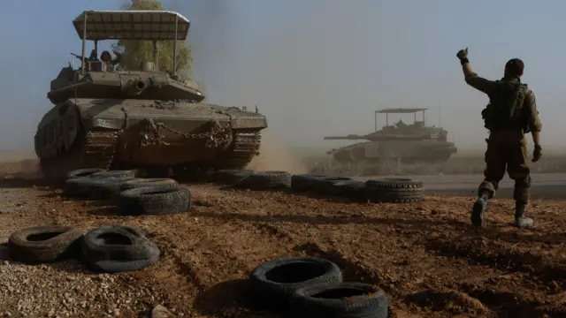 Israeli tanks take part in operations close to the border with Gaza