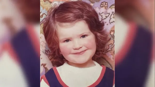 A photo of Joanna Parrish as a toddler