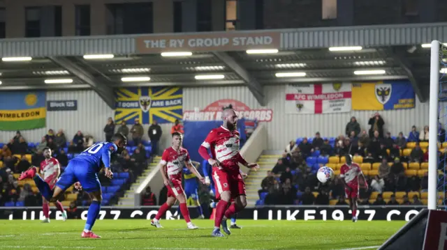 Ali Al-Hamadi scores AFC Wimbledon's second goal against Ramsgate