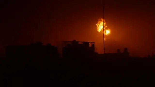 An explosion from an Israeli air strike hits close to Khan Younis in southern Gaza