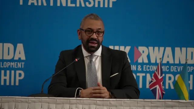 James Cleverly speaks at a press conference