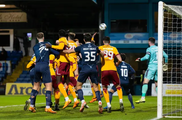 Simon Murray heads home through a crowd of bodies