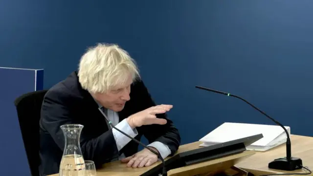 Screen grab from the UK Covid-19 Inquiry live stream of former prime minister Boris Johnson giving evidence at Dorland House in London