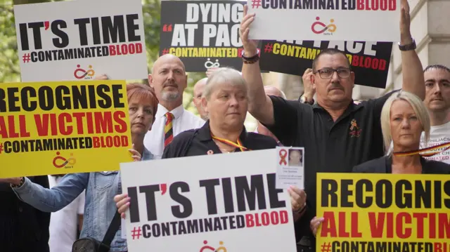 Campaigners, including many who are personally infected and affected by infected blood, gather in Westminster, London, calling for compensation for victims to be authorised by Prime Minister Rishi Sunak, who is giving evidence later to the Infected Blood inquiry. Picture date: Wednesday July 26, 2023. PA Photo.