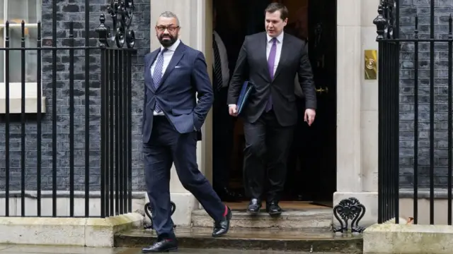 Foreign Secretary James Cleverly (left) and Minister of State at the Home Office Robert Jenrick leaving 10 Downing Stree