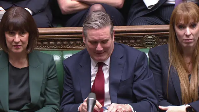 Sir Keir Starmer chuckles in the House of Commons