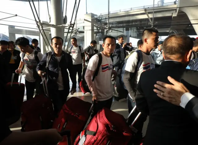 Former Thai hostages arrive in Bangkok, 30 November