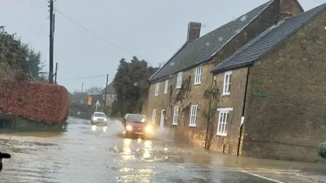 Flooded road in Haselbury Plucknett