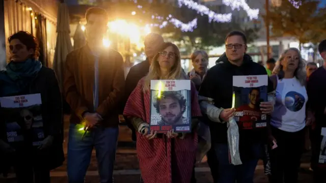 Idit Ohel, mother of Alon Ohel, 22, and her family gathered with other families of hostages in Karmiel to light candles