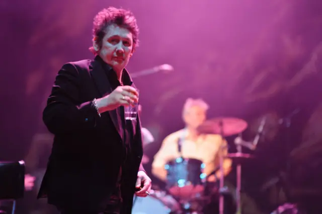 Shane MacGowan performing in Brixton