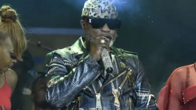 Congolese singer Koffi Olomide performs on stage at the Festival of Urban Music of Anoumabo (Femua) in Abidjan, early on September 12, 2021.