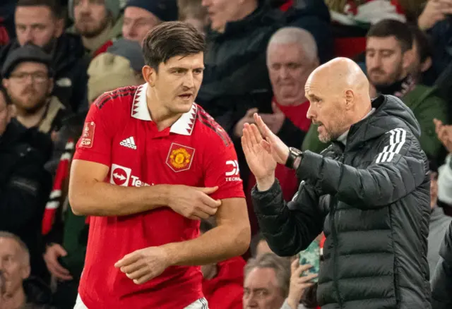 Harry Maguire and Erik ten Hag