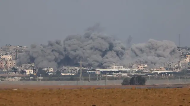 Smoke rises following an Israeli airstrike on Gaza