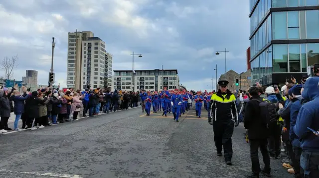 Crowds waiting for the hearse