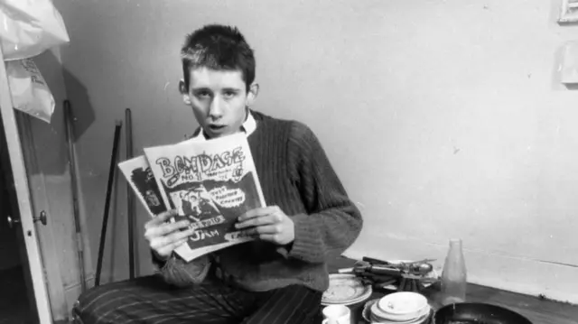 19-year-old Shane MacGowan, editor of punk rock magazine 'Bondage' in his office at St Andrews Chambers, Wells Street, London. He went on to front The Pogues. Original Publication: People Disc - HJ0379 (Photo by Sydney O'Meara/Getty Images)