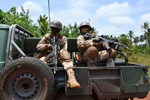 Nigerien soldiers take part in the Flintlock 2023 military training hosted by the International Counter-Terrorism Academy, in Jacqueville, Ivory Coast, on March 11, 2023.