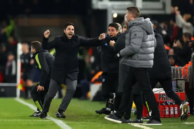 Mikel Arteta celebrates Declan Rice's late winner at Luton