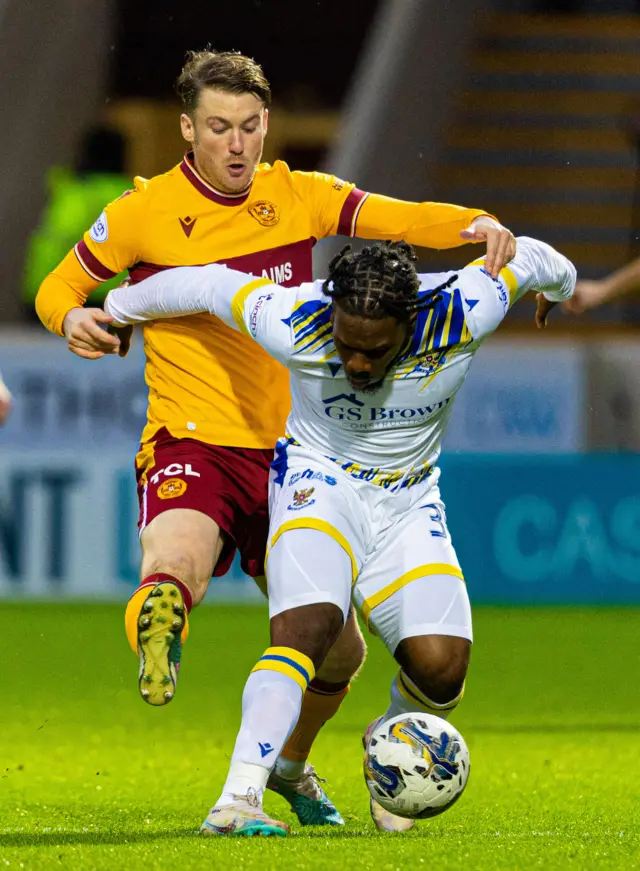 Motherwell's Callum Slattery and St Johnstone's Daniel Phillips