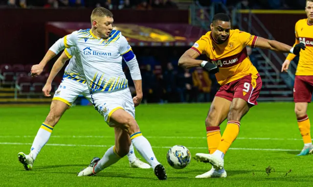 Motherwell's Jonathan Obika has a shot past St Johnstone's Liam Gordon