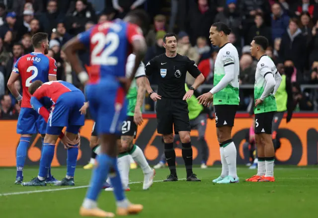 Referee Andy Madley before a VAR review after a penalty was awarded to Crystal Palace