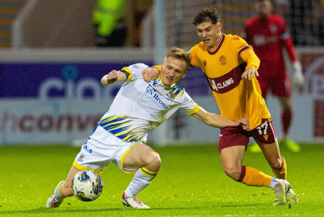 St Johnstone's Matt Smith and Motherwell's Davor Zdravkovski