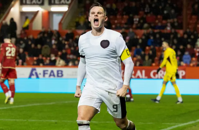 Hearts forward Lawrence Shankland celebrates