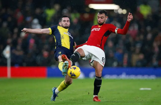 Bruno Fernandes and Lewis Cook