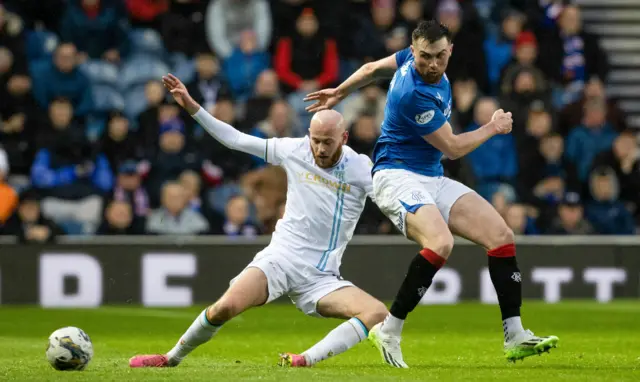 Dundee's Zak Rudden and Rangers' John Souttar