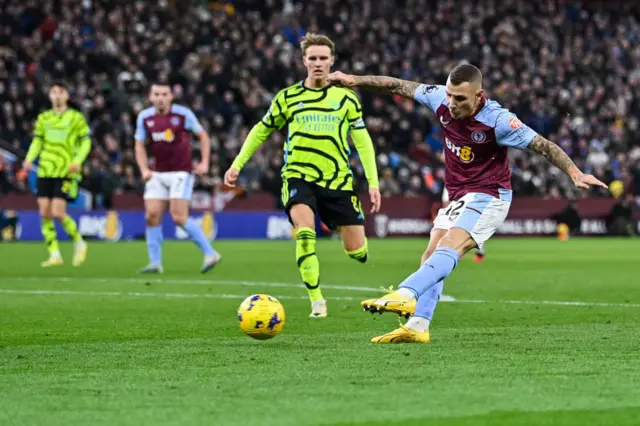 Lucas Digne takes a shot